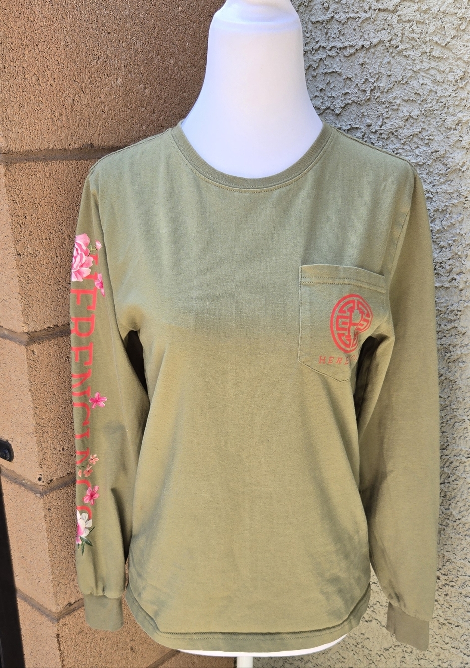 Herencia Olive Green Long Sleeve Pocket Tee with Pink Floral Sleeve Detail